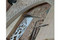 Arabesque arch panel — solid wood grain and finish detail