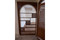 Arched wood room divider in hand-cut solid wood