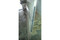 Carved mashrabiya screen — solid wood grain and finish detail