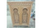 Carved arched cabinet in hand-cut solid wood