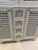 Carved bathroom vanity cabinet — rope-carved trim and lattice drawer fronts
