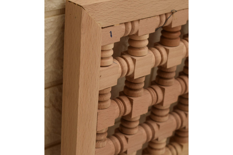Natural beech turned spindle panel in hand-cut solid wood