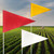 Group of three tile and field markers in a crop field.