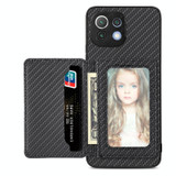 For Xiaomi Mi 11 Lite Carbon Fiber Magnetic Card Bag Phone Case(Black)