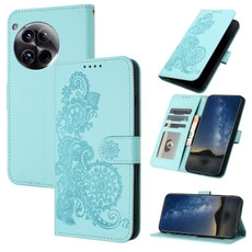 For OnePlus 12 Datura Flower Embossed Flip Leather Phone Case(Light blue)