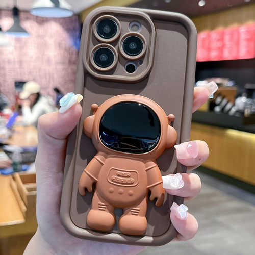 For iPhone 15 Pro Astronaut 3D Relief Holder TPU + PC Full Coverage Phone Case(Brown)