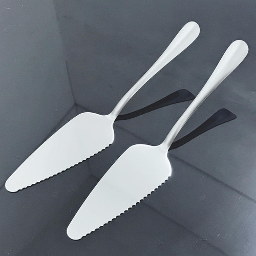 4 PCS Stainless Steel Triangular Toothed Cake Pizza Shovel 4 PCS Stainless Steel Triangular Toothed Cake Pizza Shovel