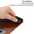 For Samsung Galaxy S23 FE Cat Embossing Pattern Leather Phone Case with Lanyard(Brown)