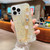 For iPhone 15 Pro Max Starry Sequin Love Gem Chain Epoxy TPU Phone Case(Yellow)
