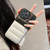 For iPhone 14 Pro Color Block Down Jacket Phone Case(Black Orange)