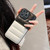 For iPhone 15 Color Block Down Jacket Phone Case(Black Yellow)
