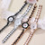 Lvpai Round Dial Two-Color Stainless Steel Strap Bracelet Quartz Watch for Women(Gold Black)
