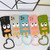 For iPhone 14 Wave Edge Big Duck Silicone Phone Case with Wristband(Black)
