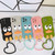 For iPhone 12 mini Wave Edge Big Duck Silicone Phone Case with Wristband(Black)