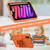 For iPad mini 6 Pure Color PC + Silicone Anti-drop Protective Tablet Case with Butterfly Shape Holder & Pen Slot(Kumquat)