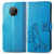 For Nokia G300 Four-leaf Clasp Embossed Buckle Leather Phone Case(Blue)