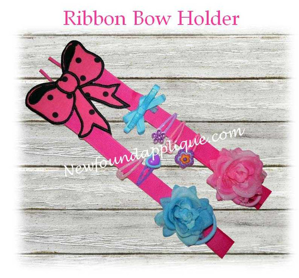This is a Ribbon holder from Newfound Applique . These are design that are made using an embroidery machine stitched in the hoop to make a fun project