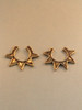 Pair of stackable bronze Ninja Star Ear cuffs.