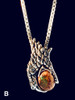 Phantom Viper Snake Head Pendant with Mexican Matrix Fire Opal and Faceted Fire Opal on back - Option B Phantom Viper Snake Head Pendant with Mexican Matrix Fire Opal and Faceted Fire Opal on back - Option B