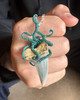Original Wax for the Octopus Shark Tooth Pendant - Modeled on a man's hand.