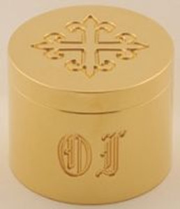 Solid Brass. 24k Bright Gold Plated. Engraved with OI and an Engraved cross on cover. Measures 1 3/8"H. x 1 11/16" dia.