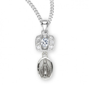 15/16" Sterling Silver Miraculous Medal hangs from a rectangle shaped pendant with Swarovski crystal set cubic zircons.  Supplied with an 18" genuine rhodium plated chain in a deluxe gift box.  Made in the USA.