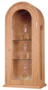 Ambry with glass panels, glass shelves, and a brass lock. Dimensions: 35" height, 16" width, 9" depth. Chrismal set not included