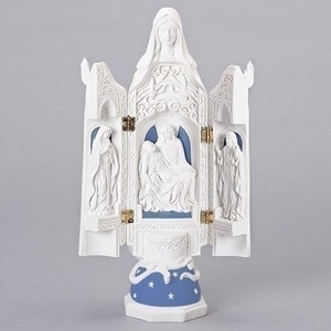 Della Robia Pieta Triptych. This beautiful Della Robia Pieta Table Top Triptych is a great reminder of what Easter is really all about. The Della Robia Pieta Triptych stands 12.2" tall and has a width and depth of 3.15". When closed the triptych becomes a praying Blessed Mother statue. A gorgeous decoration for your Easter Celebration!