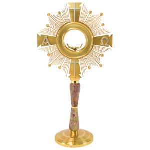 Gold plated monstrance with the cross