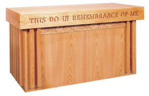 Communion table with open back, two shelves, and a  sliding door with lock. Dimensions: 32" height, 60" width, 24" depth