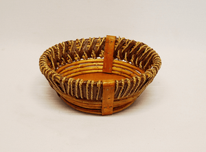 This basket is a small rustic style round basket. The small rustic basket measures 10" dia x 4 " deep. Lightweight and easy to handle!