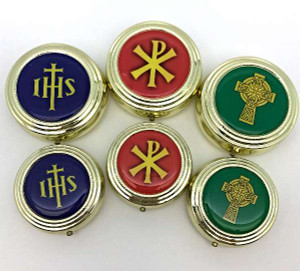 Colored enamel pyx with IHS, Chi Rho, or Celtic Cross.
2 Sizes available: 2"W x 5/8"H, 6-8 host capacity
2 1/4"W x 3/4", 8-12 host capacity.
Sold individually. 