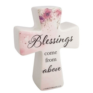 6"H Blessings Cross-Blessings Come from Above. Made of Porcelain. Pink Flowers on the cross. The words "Blessings Come From Above." are written on the porcelain cross