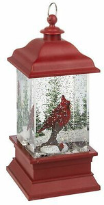 LED Light Up Cardinal Lantern.  Dimensions: 4 1/4" W x 4 1/4" D x 9" H. Requires 3 AA Batteries (Not Included). Weighs 3 pounds