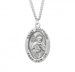 Sterling silver oval St. Matthew medal comes on a 24" genuine rhodium plated curb chain. Dimensions: 01.1" x 0.7" (27mm x 17mm). Weight of medal: 2.8 Grams. Medal comes in a deluxe velour gift box. Engraving option available. Made in the USA.