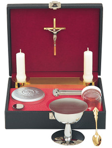 Stainless steel chalice with 3" cup, paten, oil stock, sprinkler, and host box. Removable tray with 7/8" socket. Gold spoon, wine bottle, and detachable crucifix. Complete with 8" x 10" x 2-3/4" case.