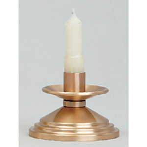 Bronze, Satin Finish Candlestick. 2" Height, 4" Base. 7/8" socket. Complementary Crucifix K535-AC