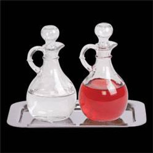 Cruet & Tray Set. Polished Stainless Steel Tray measures 6 1/2" x 9 1/2". Cruets 6" High, 10 oz. Capacity. Tray and Cruets can be purchased separately

 