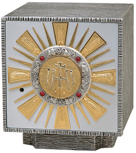 Tabernacle in Oxidized silver with gold rays. Four ruby stones. 24k bright gold plated inside.
Outside dimensions: 11-1⁄4˝H. x 9-3⁄4˝W. x 9-3⁄4˝D. Door opening: 8-1⁄2˝H. x 8-1⁄4˝W. Wt. 36 lbs. Silver as shown.