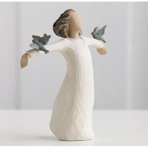 A faceless girl in a white dress with arms held out and three birds resting on them. Happiness....Free to sing, laugh, dance create. Figurine is 5.5" tall.  She exudes a feeling of freedom, hope and strength, as a young girl throws her arms open to receive a group of bluebirds.