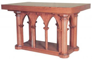 The 535, 536, 537 & 538 series altars offer elegant woodworking along with a refined design. A series of 8 pillars support a solid wood surface. Made from red oak, this handmade alter will fit in beautifully with existing furniture and can be used for services or for decor. Few altars compare. Choose from a variety of sizes and wood stains. 
Dimensions:
(#535)  39" height, 60" width, 36" depth
(#536)  39" height, 72" width, 36" depth
(#537)  39" height, 84" width, 36" depth
(#538)  39" height, 48" width, 48" depth