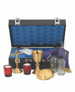 Travel Mass Kit includes: Chalice Ht. 5 1/4”. 5 oz. Host box cap. 55. Cross Ht. 5 3/4”. Cruets 4 oz. Candles 2”. Case w/lock. 14 7/8” x 9 1/2” x 4 5/8”.