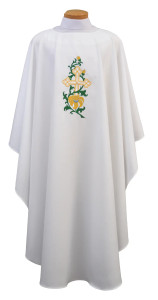 Ample cut (60"W x 52"L), lightweight, textured fortrel polyester-linen weave.  Multicolor Swiss Schiffli Embroidery on front only or front and back. Self lined stole is included with each chasuble. Available with roll collar at an additional cost