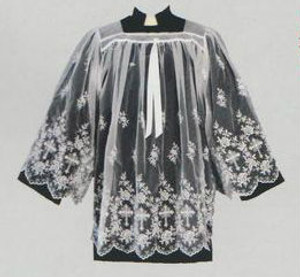 Wash and wear embroidered sheer nylon surplice, Swiss schiffli embroidered. Available in S,M,L and XL.  See sizing chart on product description page