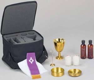 Traveling Mass Kit with Soft Case - Soft side case 11 1/2" x 9" x 6" with die-cut superfoam inside. Includes 4 1/2" tall 24 K gold plated chalice, one combination paten/host (paten serves as lid for host box), a pair of votive glass candlesticks, one standing cruxifix, one each water and wine bottle. Includes priest's stole and altar linen.