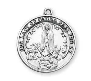 1-1/16" Sterling Silver Our Lady of Fatima Medal. A 24" rhodium plated curb chain is included. Deluxe Velour Gift Box. Made in the USA. 