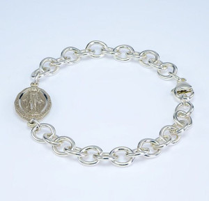 Solid Sterling Silver Heavy Link Bracelet with 1" Sterling Silver Miraculous Medal Connector. Comes in a deluxe velour gift box. Made in the USA.