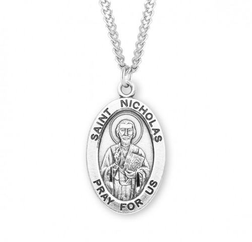 Sterling silver oval St. Nicholas medal comes on a 24" genuine rhodium plated curb chain. Dimensions: 01.1" x 0.7" (27mm x 17mm). Weight of medal: 2.8 Grams. Medal comes in a deluxe velour gift box. Engraving option available. Made in the USA

 