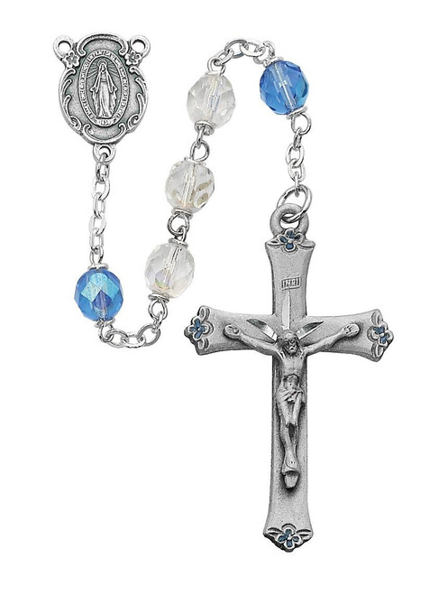  7MM Blue and Crystal Beads Rosary. Center and Crucifix are made of pewter. Gift box included. Made in the USA