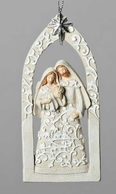 5.5"H Resin/Dolomite Paper Cut Ornament depicting the Holy Family with Bethlehem Star above. Beautiful addition to your tree decorations or use as a window hanging! Dimensions: 5.31"H x 0.6"W x 2.36"L